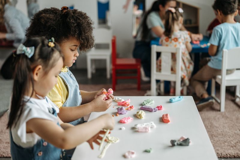 Children playing together at a daycare centre in Surrey